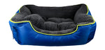 Blue and gray pet bed with yellow trim on a blue background