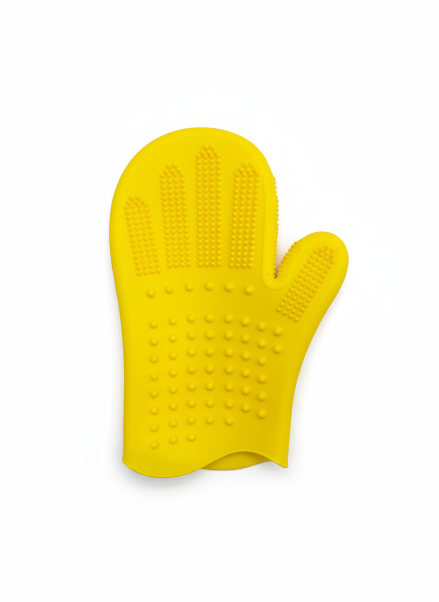 Yellow silicone oven mitt on a white background