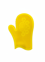 Yellow silicone oven mitt on a white background