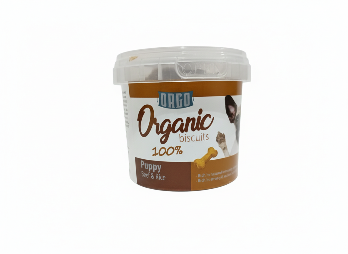 Container of Daco Organic Biscuits for puppies on a white background